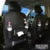 Black RoadTrip car backseat organizer thumbnail showing installation in car interior