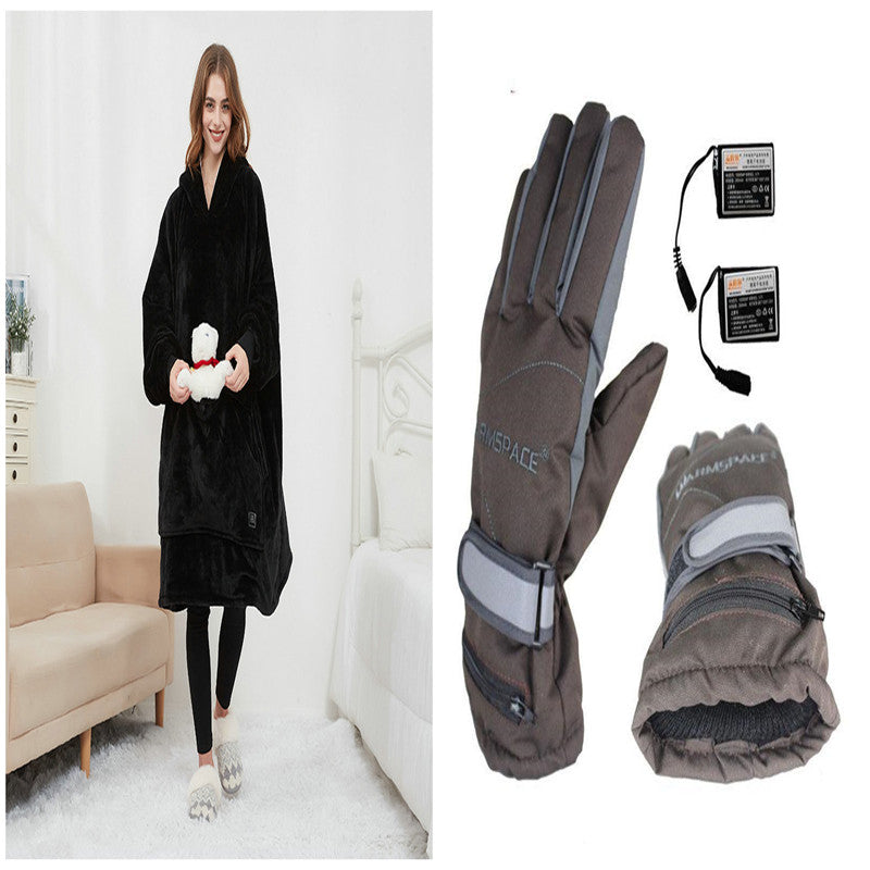 Woman wearing black CozyGlow heated hoodie blanket next to included heated gloves with rechargeable battery packs