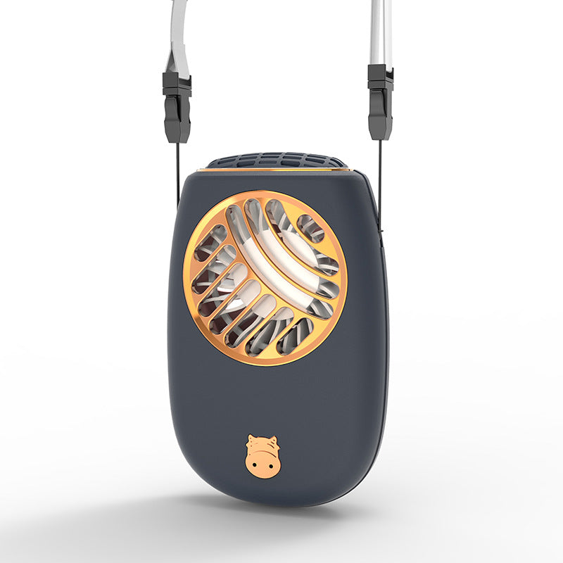 Navy blue BreezeGo portable neck fan with gold trim and cat charm, close-up