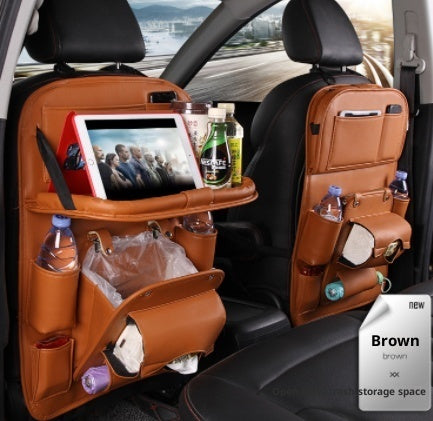 Brown RoadTrip car backseat organizer installed on car seat with tablet tray and drink pockets