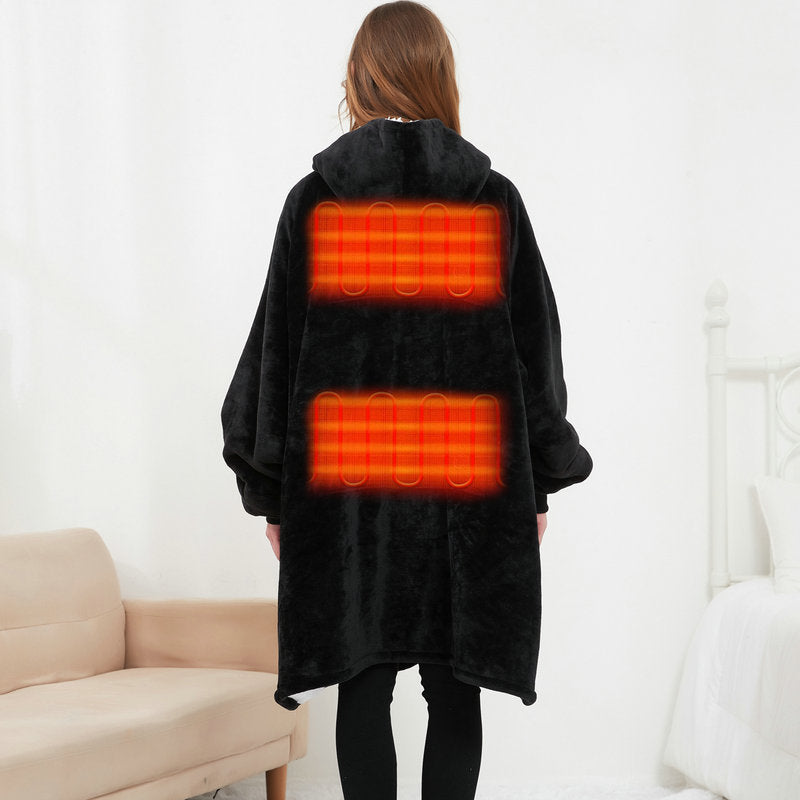 Back view of black CozyGlow heated hoodie blanket showing two glowing heating zones on the upper and lower back