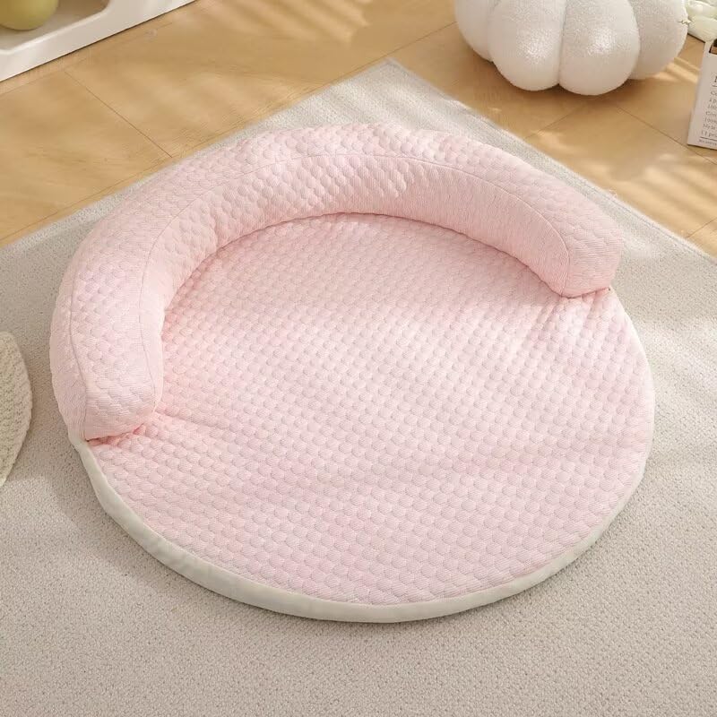 Pink quilted CoolPaws round pet cooling mat on tile floor
